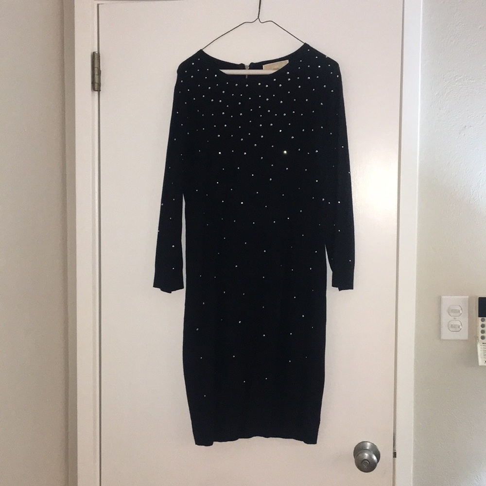Fun black dress with small silver studs.